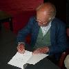 Paul van den Abeele signeert het fotoboek